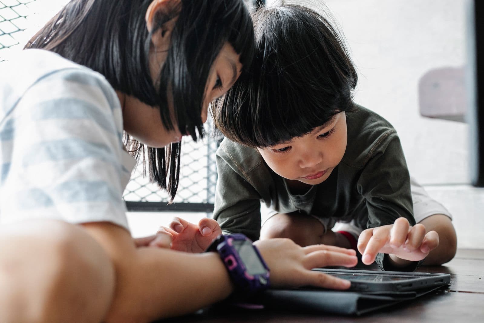 Children using tablets in a rural classroom