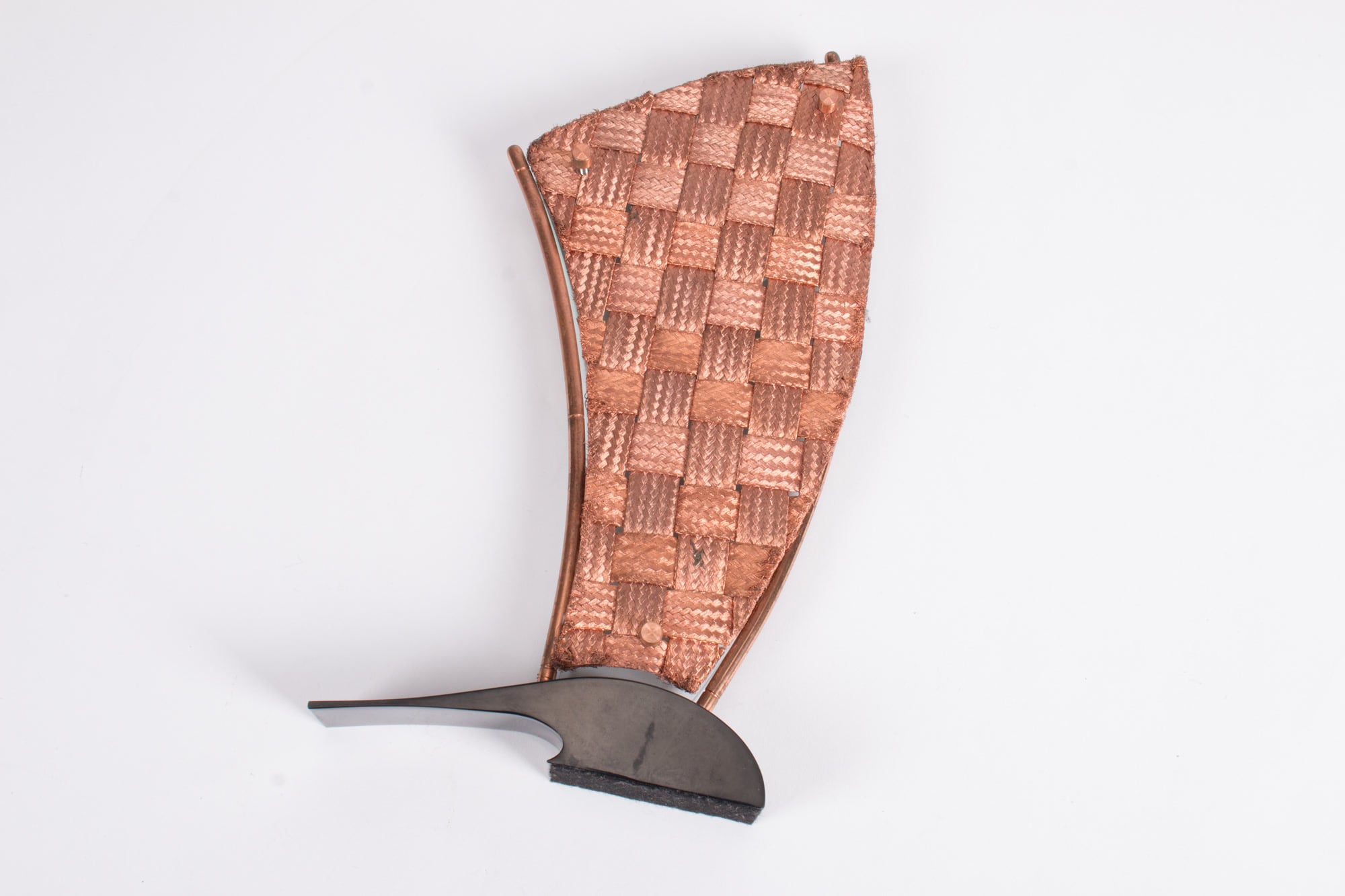 A woven copper music award from the Auckland Museum collection